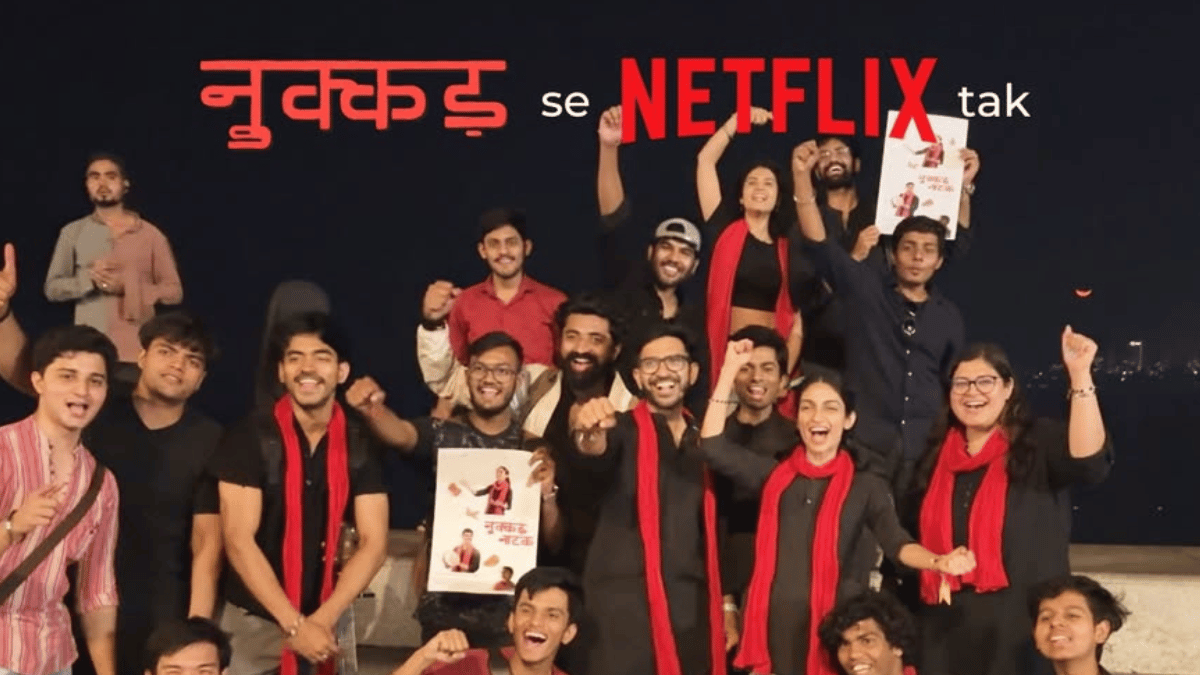 Poster of the independent film Nukkad Naatak, now streaming on Netflix, highlighting street theatre and social issues through the journey of two students working with children from a slum.