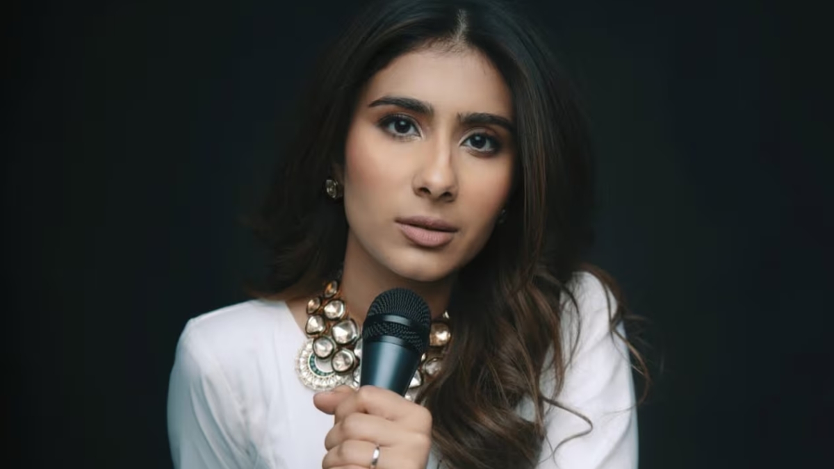 An article exploring how Nayab Midha’s stadium tour announcement signals a major shift for spoken word poetry in India, questioning whether an intimate art form can scale to large audiences.