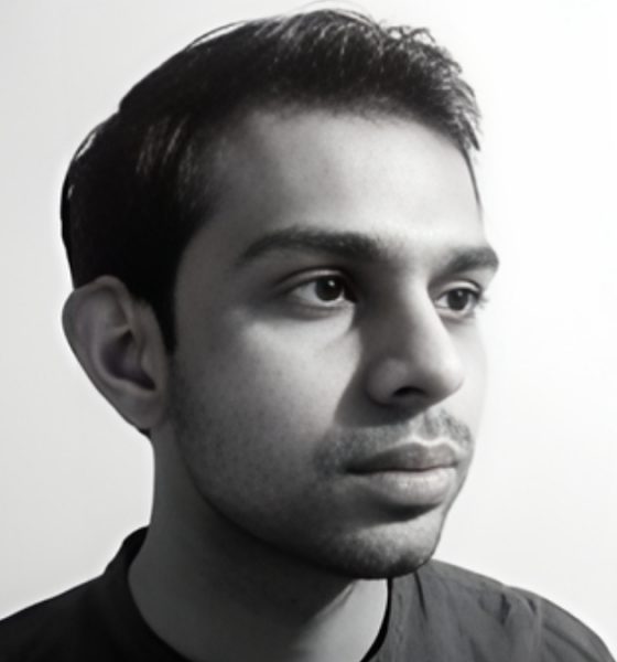 Mithil Thaker Indian visual artist and founder of STRT91 posing with his street-inspired illustrations.