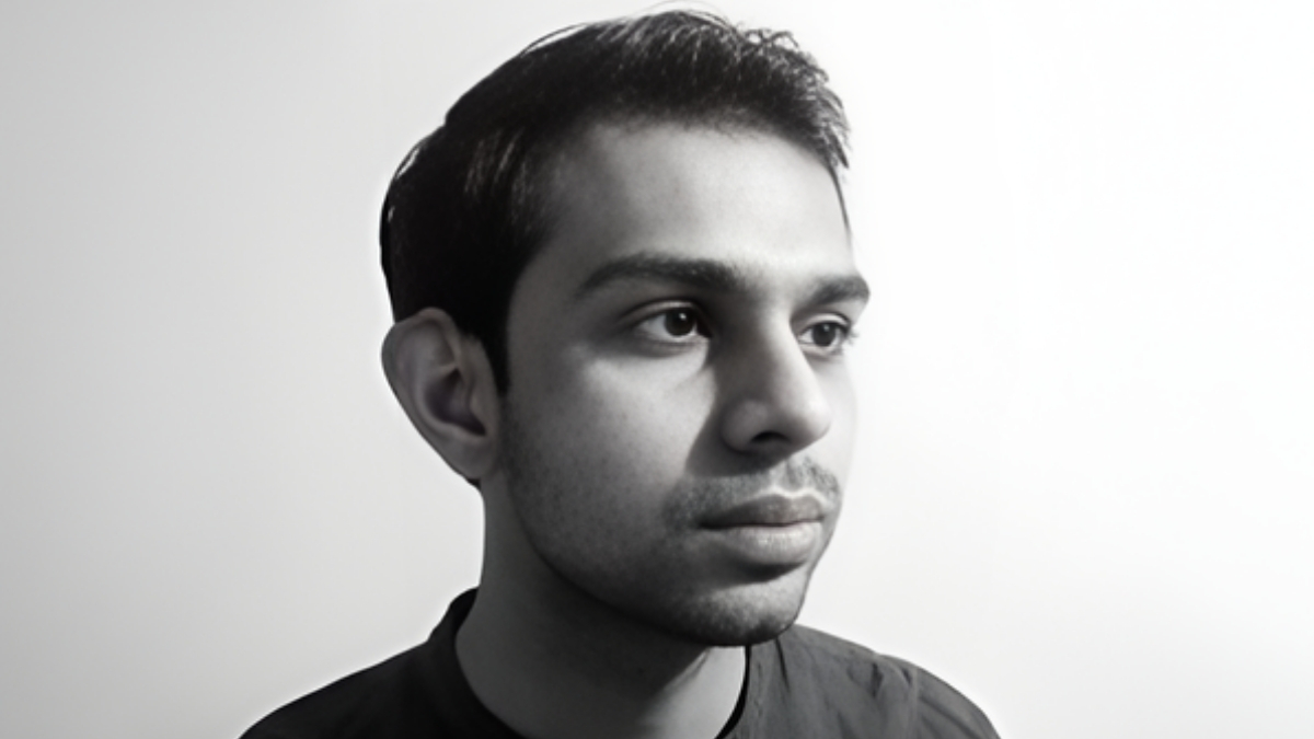 Mithil Thaker Indian visual artist and founder of STRT91 posing with his street-inspired illustrations.