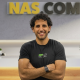 Promotional visual for Nas.com funding announcement showing AI-driven entrepreneurship concept, featuring digital business tools, solopreneur workflow automation, and references to founder Nuseir Yassin and $27M Series A investment led by Vinod Khosla of Khosla Ventures.